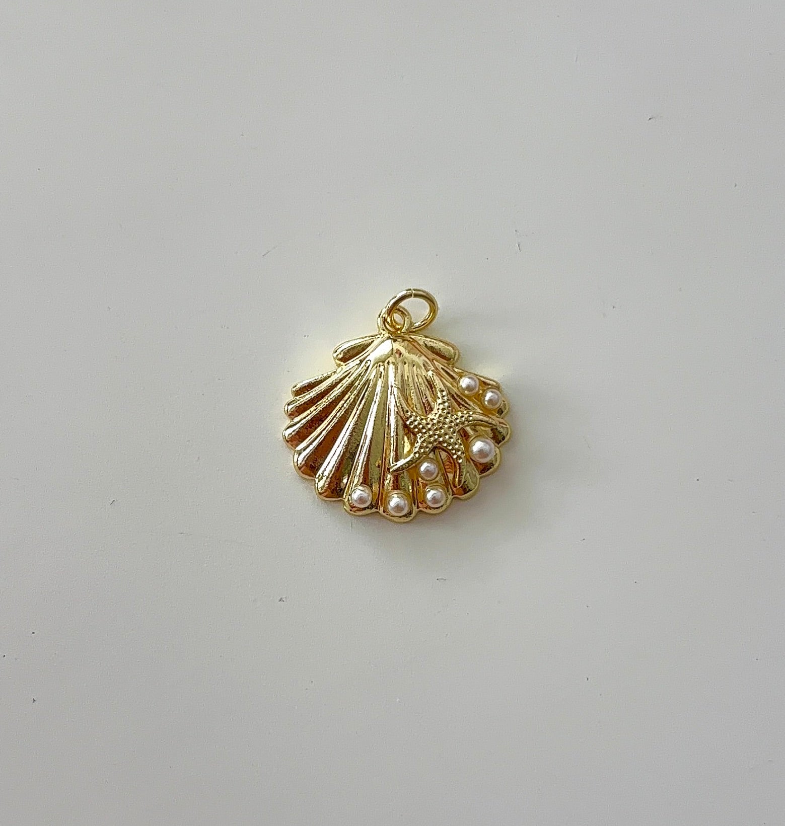 Shell pearl charm