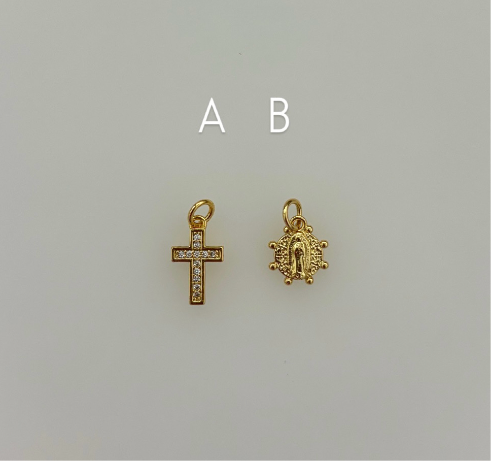 Virgin Mary and cross charms