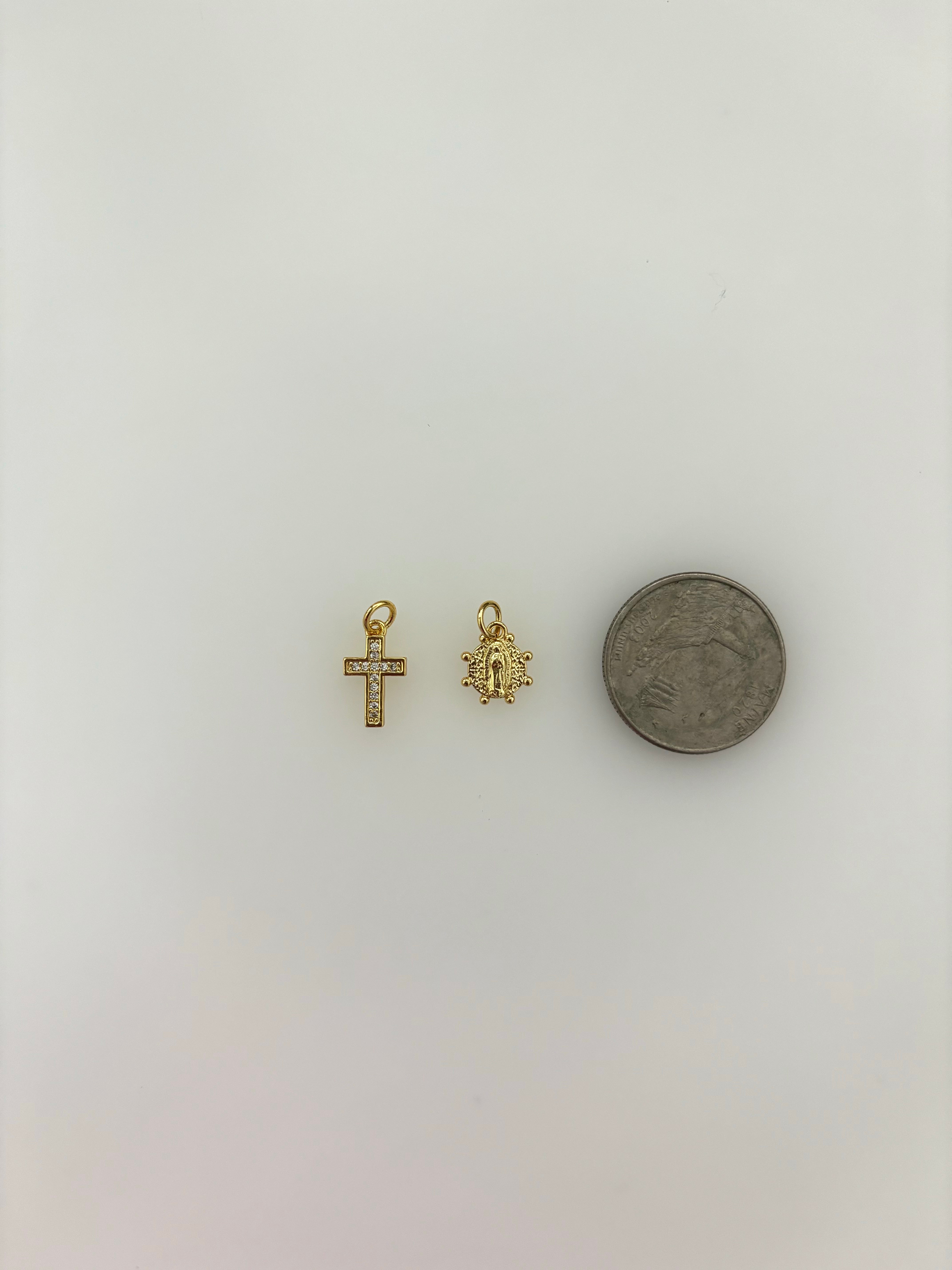 Virgin Mary and cross charms