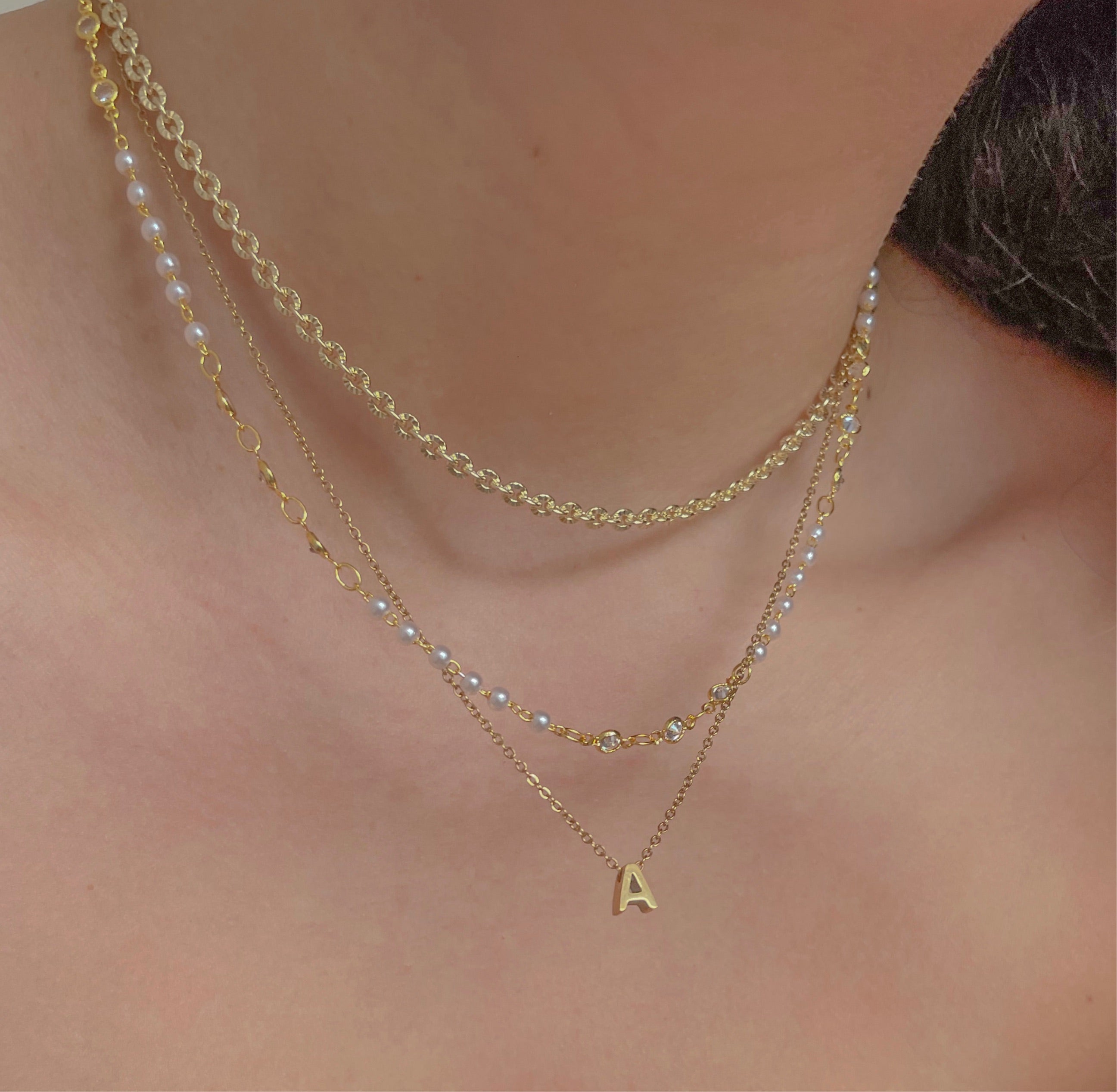 Delicate initial