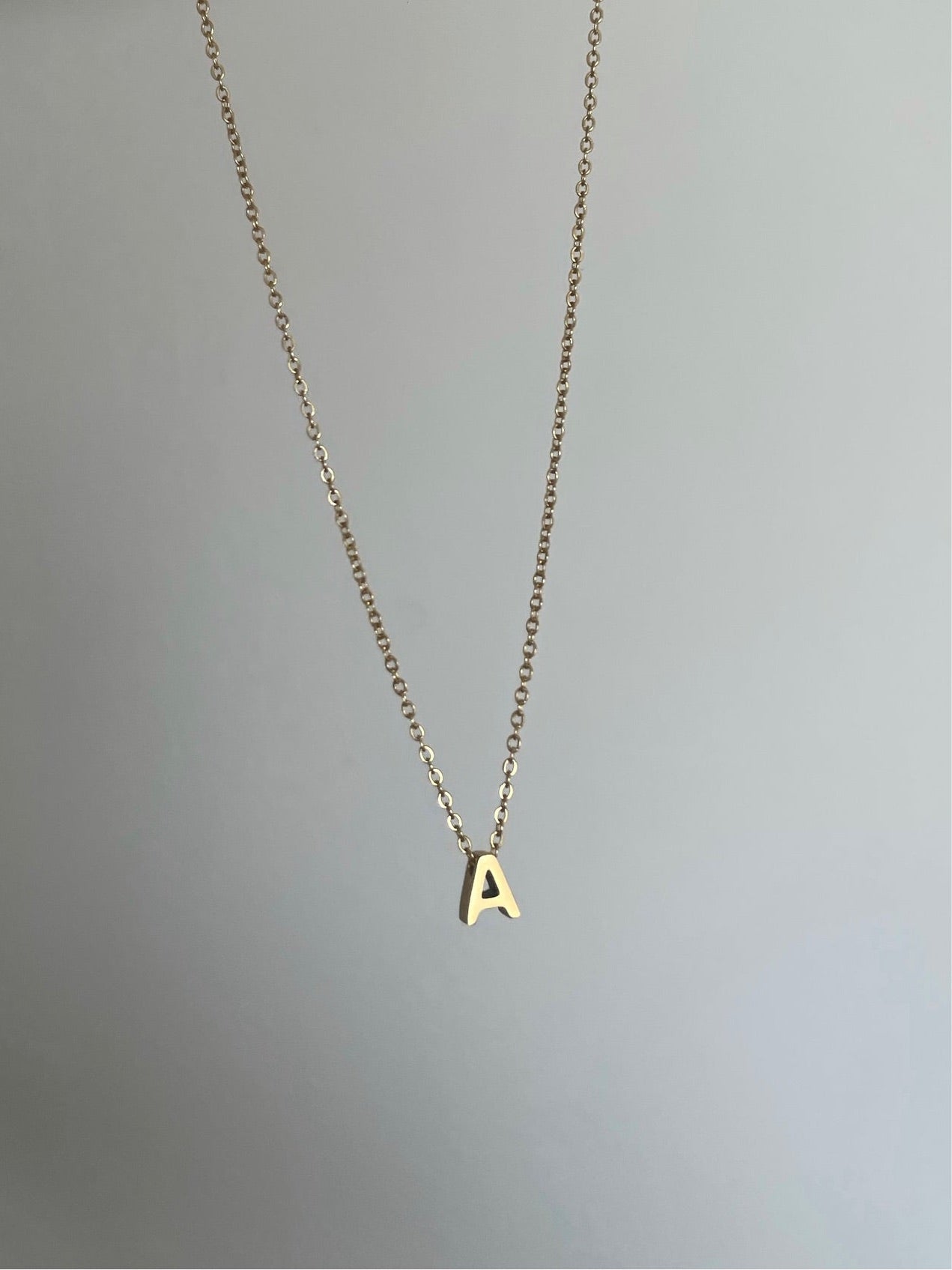 Delicate initial